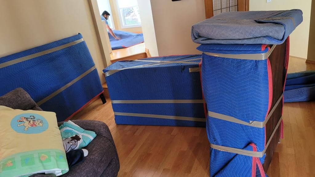Moving boxes and packing supplies in a cozy home setting in Calgary.