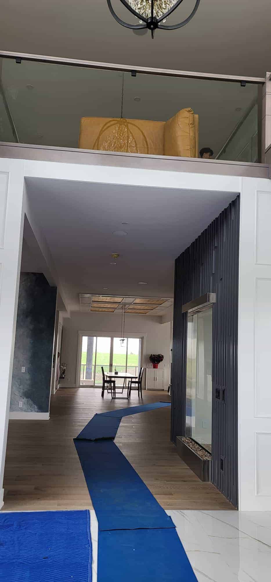 Professional Calgary moving company interior with modern decor and a blue moving path.