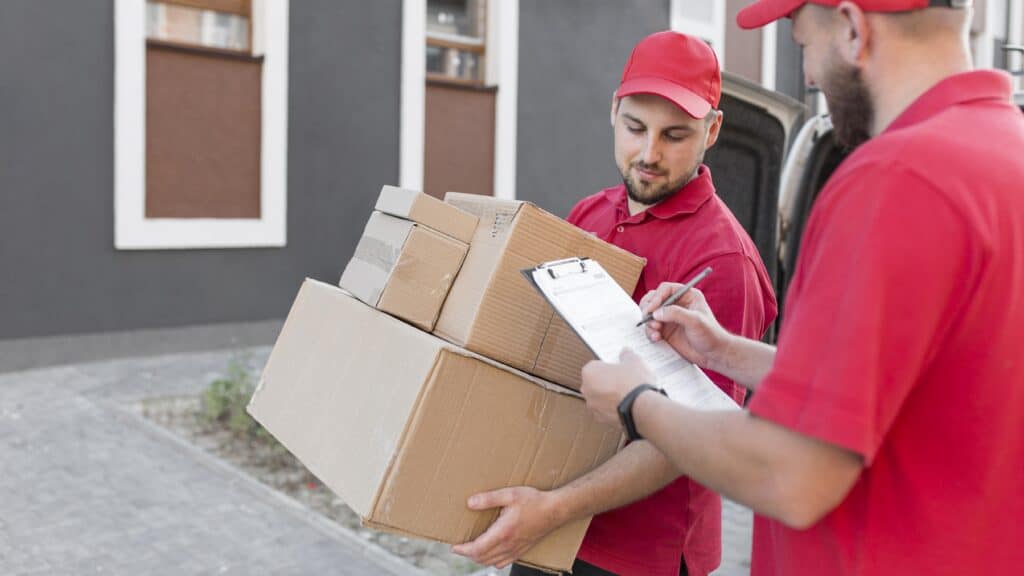 Movers in Camrose carrying boxes