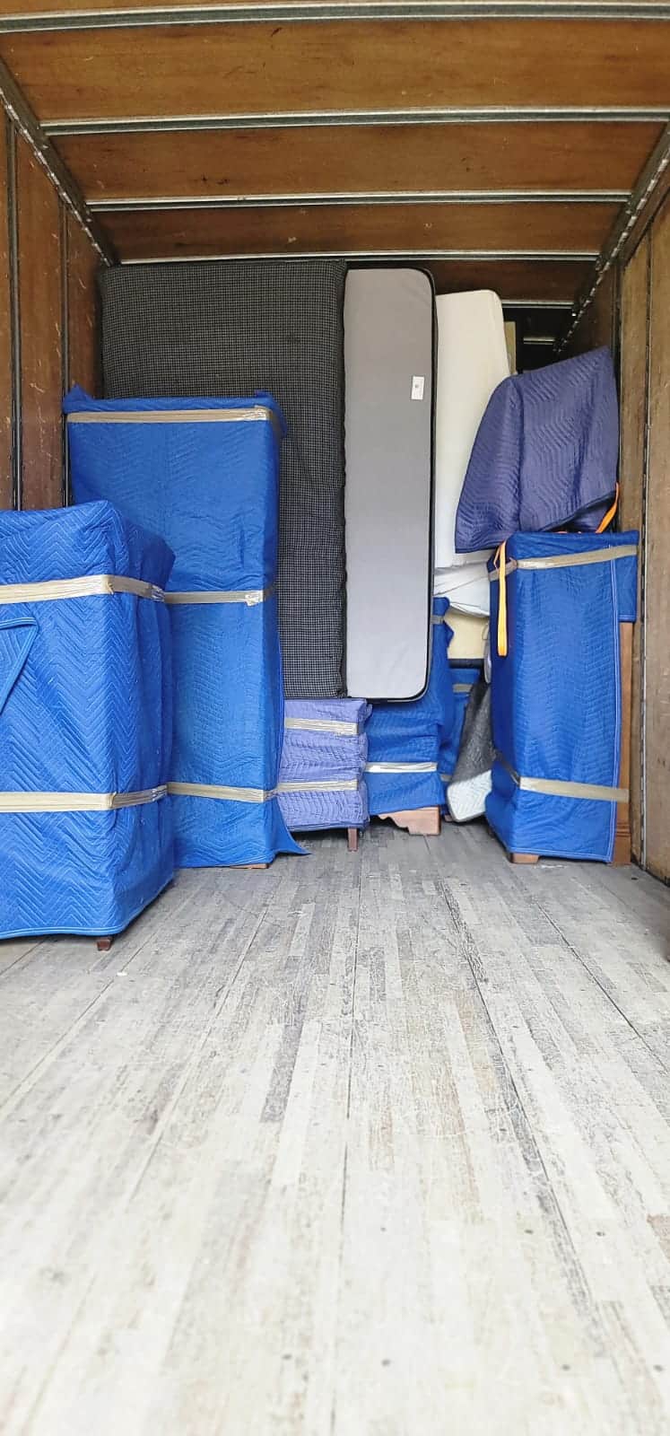 Moving truck with packed boxes and furniture for Calgary relocation