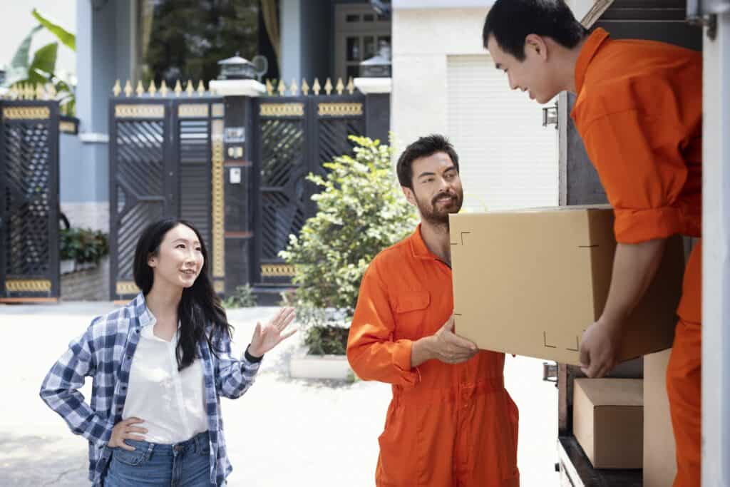 Movers in Spruce Grove loading boxes into a moving truck