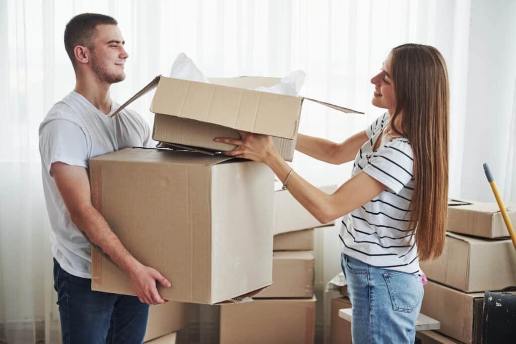 Professional movers handling boxes during a move in Strathmore