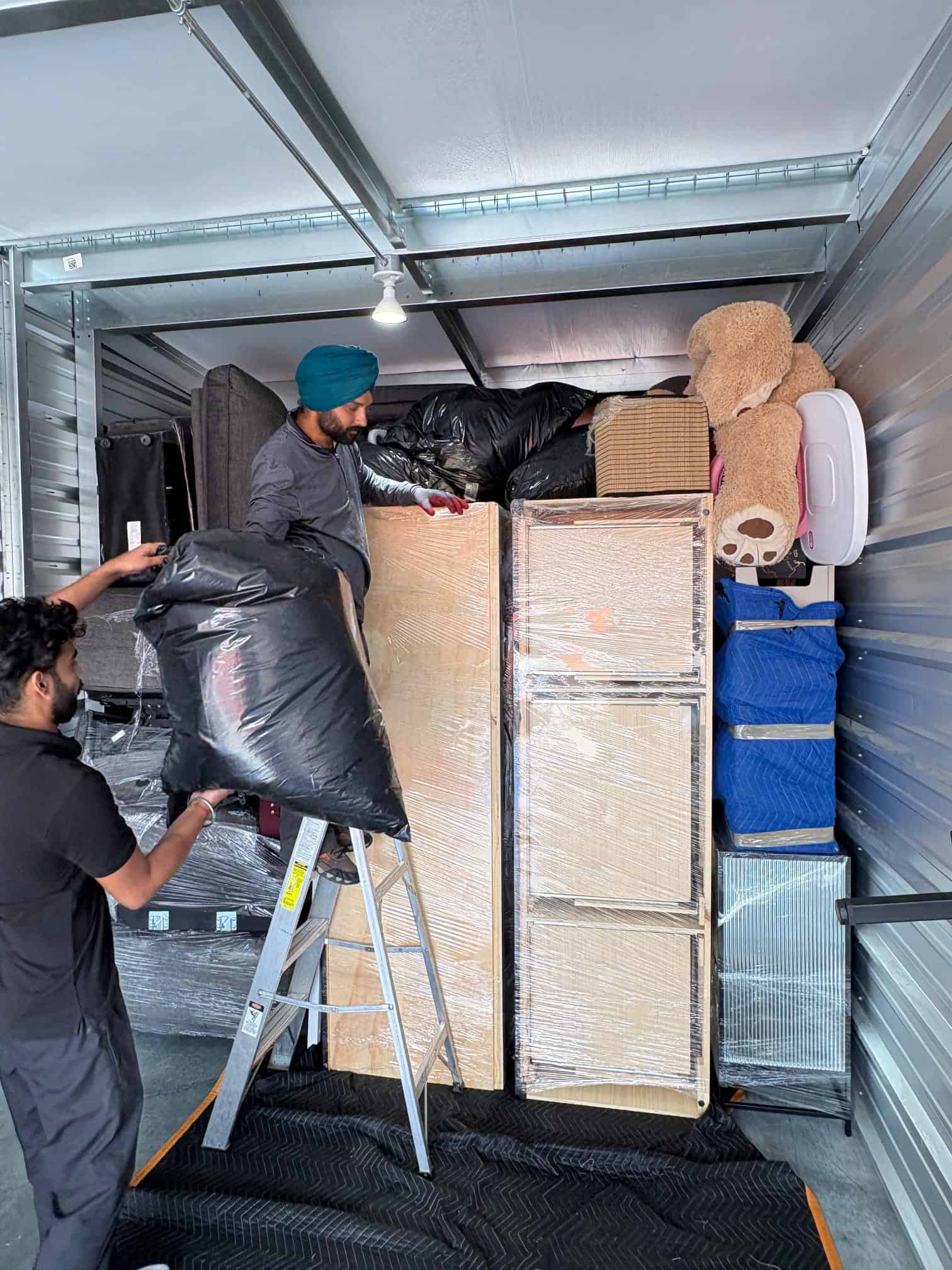 Movers packing and loading furniture in Edmonton