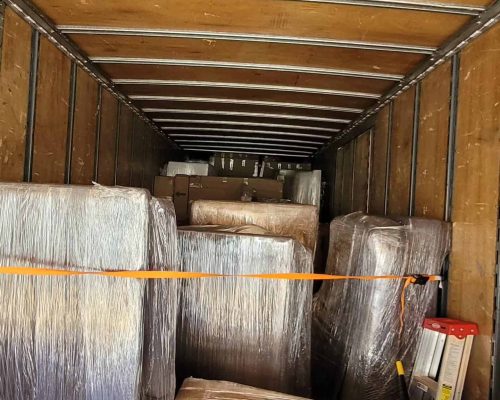 Securely packed furniture and boxes inside a moving truck for safe transport in Calgary.